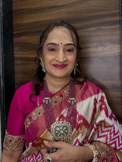 A portrait of the bride's elegant aunt. The makeup is soft and enhances her features beautifully.