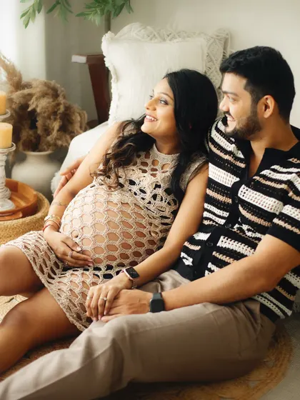 A candid and happy moment captured between poses. The best photos often happen in these in-between moments of genuine laughter and connection.