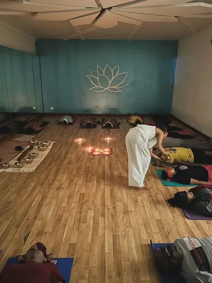 From another angle, you can see the peaceful atmosphere of the studio as participants rest. My focus is on creating a safe and nurturing environment where healing can naturally occur.