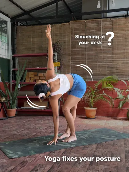 Slouching at your desk all day? Yoga can help fix your posture. Twisting poses like this Parivrtta Trikonasana (Revolved Triangle) variation strengthen the core and back muscles that support a healthy, upright spine.