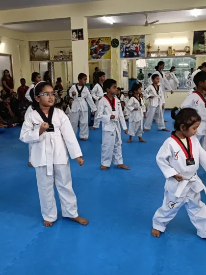 Another angle of the white belt class practicing their blocks.