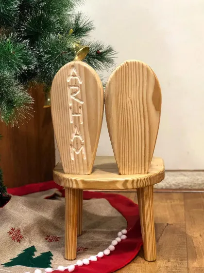 Here you can see the detail of the name engraving on the back of a bunny chair. I can personalize these pieces to make them a wonderful and unique gift for any child.
