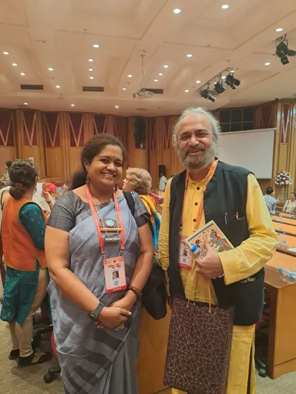 With a fellow scholar at the seminar.