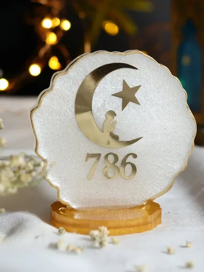 Another angle of the pearlescent resin art piece, showcasing its shimmer and the delicate details of the design.