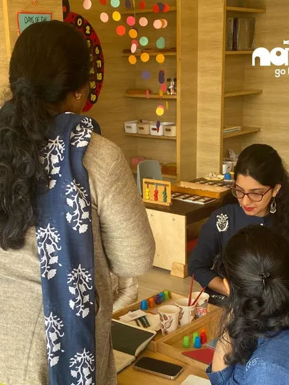 A group of educators and parents engage in a workshop about the Reggio Emilia approach. This image shows my commitment to creating inspiring learning spaces that encourage collaboration and artistic expression.