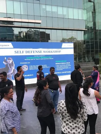Participants gathering for the corporate self-defense workshop. We create a welcoming atmosphere for people to start their learning journey.