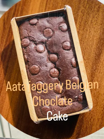 This is my healthy atta jaggery Belgian chocolate cake. It's a rich and moist loaf cake made with whole wheat flour and jaggery, topped with decadent Belgian chocolate chips.