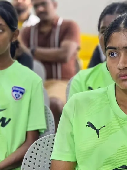Focused and ready to learn. Our girls' team players understand that success on the pitch requires dedication off it as well.