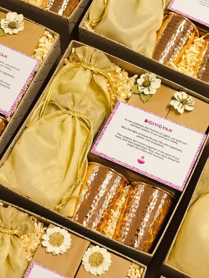 These Diwali gift boxes for iGIViGYAN feature hammered copper tumblers and festive potlis. We focus on including useful and high-quality items that recipients will love.