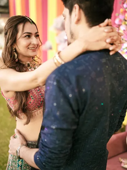 A sweet, intimate moment on the dance floor during the Sangeet night.