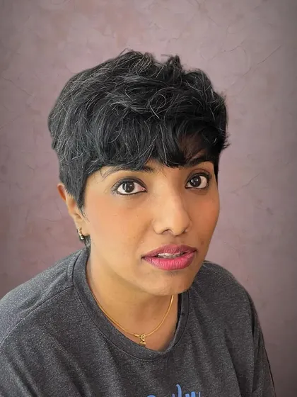 A front view of the easy-to-manage pixie cut.