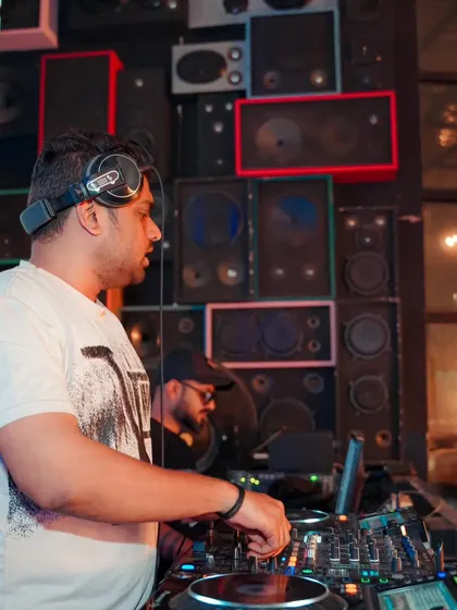 A clear shot of me at the Pioneer DJ console, my primary tool for crafting live sets. I use professional grade equipment for all my events.
