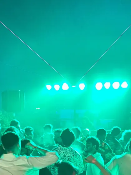 A happy new year from my favorite city, Chennai. The green lasers over the massive crowd capture the energy of ringing in 2025 with my birdlings there.