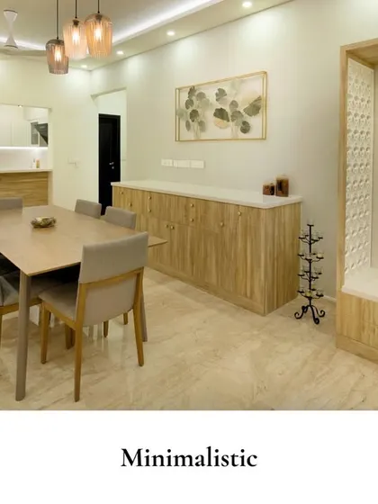 This dining space embodies a blend of minimalism and elegance. The light wood tones of the furniture and the integrated pooja nook create a sense of calm and sophistication.