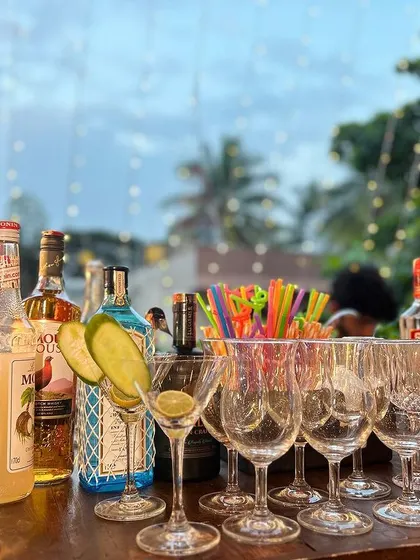 A colorful lineup of Monin syrups and other spirits on our bar, ready for a night of cocktail creation.