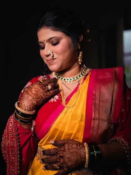 A glamorous yet traditional look featuring brown smokey eyes. This makeup style adds depth and drama while still feeling appropriate for a wedding ceremony.