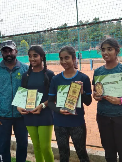 Here I am with our Girls Under 14 and Under 12 champions and semifinalists. It is moments like these, seeing the progress and success of Kanisha, Hamsini, Ishanee, and Hasini, that drive my passion for coaching.