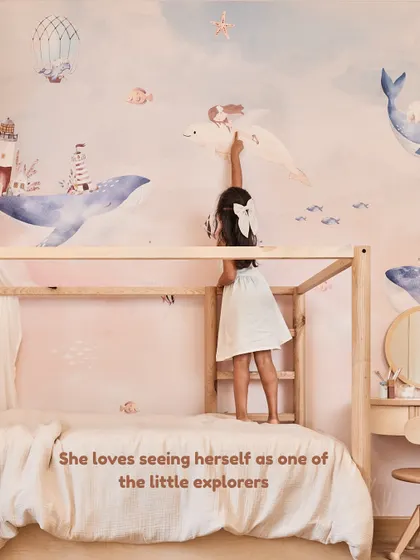 She loves seeing herself as one of the little explorers in her wallpaper. This imaginative design has encouraged her to read more and dream up new stories.
