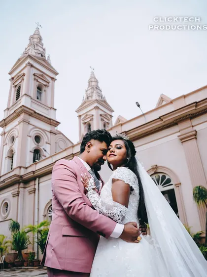 An intimate embrace between the bride and groom, a perfect capture of post-ceremony bliss.