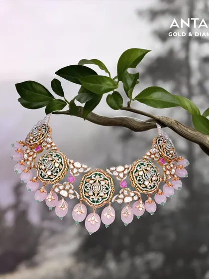 In rose quartz, polki, and emerald hues, we present 'Pride of the Bride'. Each gem in this necklace tells her story, celebrating her pride and grace.
