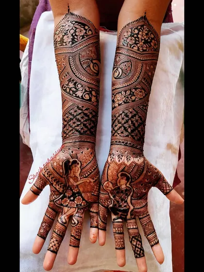 A whimsical design showing the couple dancing, capturing a moment of pure joy. The intricate patterns and floral motifs surrounding them add to the celebratory feel.
