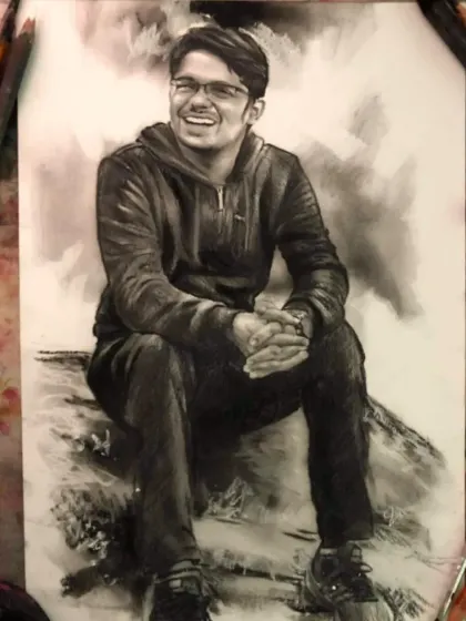 A full-body charcoal sketch of a man sitting casually. The medium is perfect for capturing the texture of his clothes and his relaxed posture.
