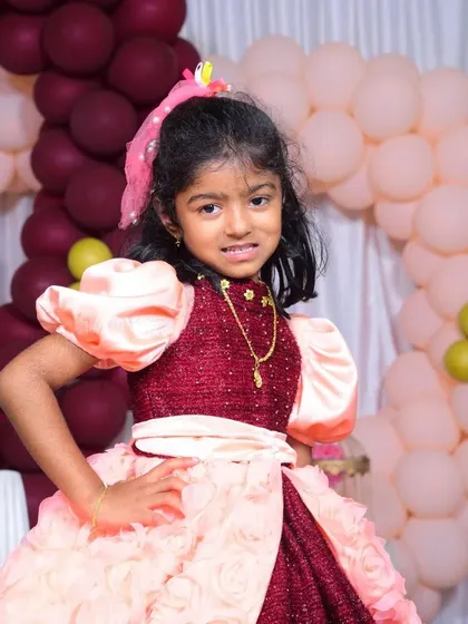 A close-up of the birthday girl. The soft colors and fun textures were chosen just for her, making her feel like the main character on her big day.