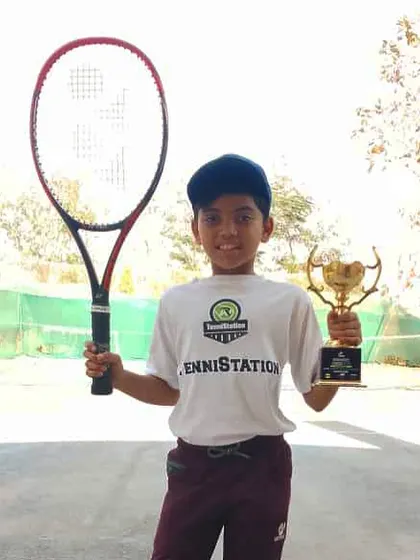 Tejaswini Godvinde secures victory in the finals of the U-10 girls singles category at the SportsFort Tennis Open Championship.