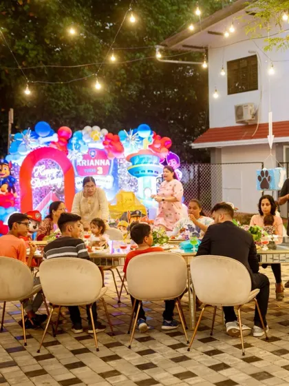 A fun-filled 3rd birthday party in an outdoor setting. The Paw Patrol themed backdrop and colorful balloons created a playful atmosphere, while the elegant tables ensured the adults were comfortable too.