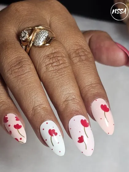 A sweet and simple hand-painted floral design. The tiny red tulips on a mix of white and pink bases create a fresh, clean, and cheerful look.