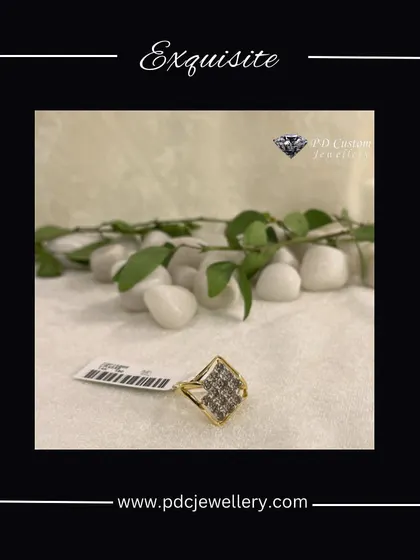 An exquisite 18kt hallmark gold and diamond ring with a distinct square head. The cluster of diamonds creates a powerful sparkle, making this a perfect cocktail or statement ring for any formal event.