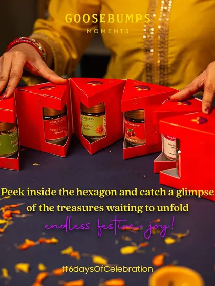 Peek inside the hexagon to see the treasures waiting to unfold. Each of the six compartments holds a jar of my artisanal snacks, like Pani Puri Cashews and Masala Cranberry, for endless festive joy.