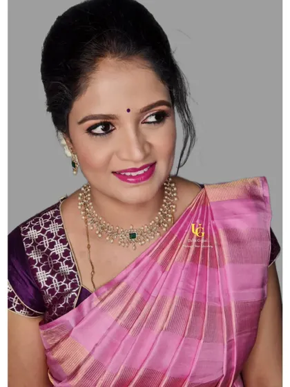 Another beautiful shot of Navya, capturing the soft glam makeup from a different angle.