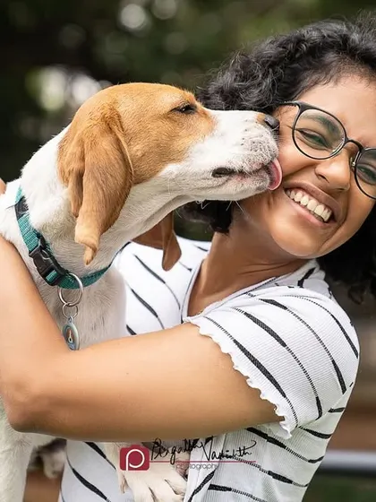 A sweet kiss for a happy Beagle. These moments of pure affection are my favorite to capture.