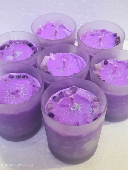 Pretty in lavender. These soothing wax jars are filled with amethyst crystals to enhance the calming properties of the lavender color, adding serenity to your space.