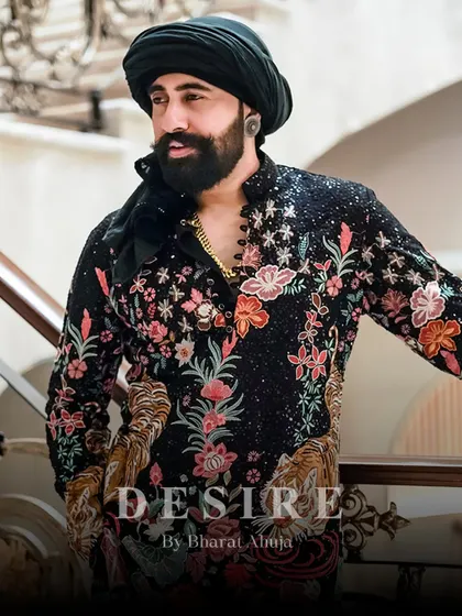 Every detail is a statement. This close-up highlights the fierce tiger and delicate floral embroidery, a combination that defines my brand of bold, artistic menswear.