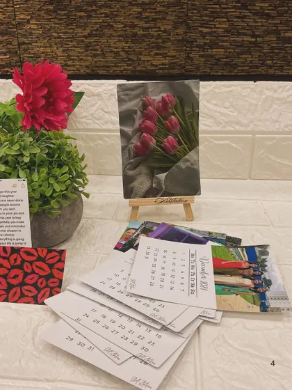 The calendar cards are versatile. You can display the current month on the easel and keep the others fanned out as a collection of your favorite moments.