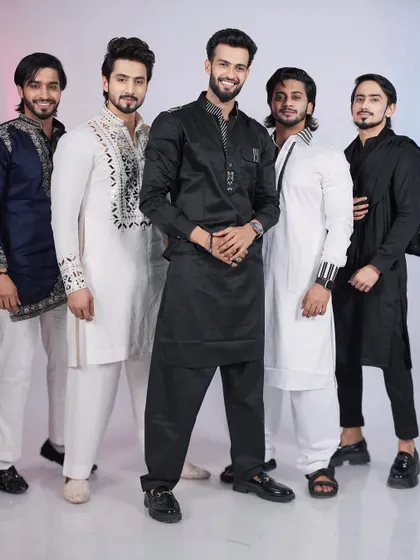 Squad goals. This image displays a range of my custom designs, from embroidered Pathani suits to modern kurtas, perfect for a group of friends attending an event together.