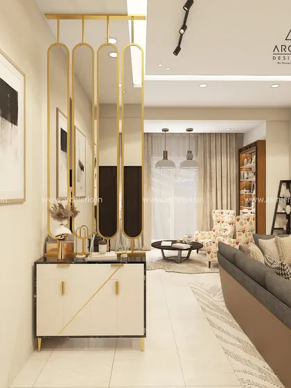 This foyer design uses a gold metal partition to create an elegant and decorative entrance. The space feels open yet defined, setting a luxurious tone for the rest of the home.