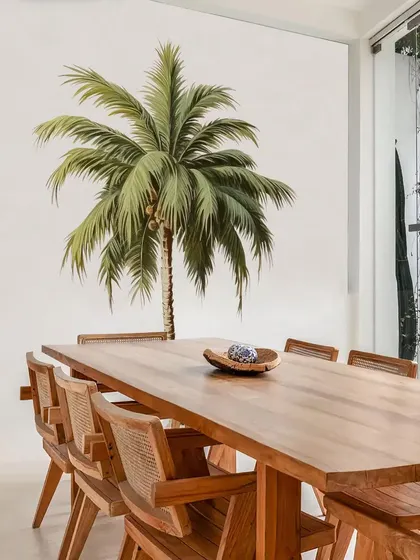 A large Bohemian Palm Tree wall sticker serves as a stunning piece of art in this dining room. The design adds a touch of nature and sophistication to the space.
