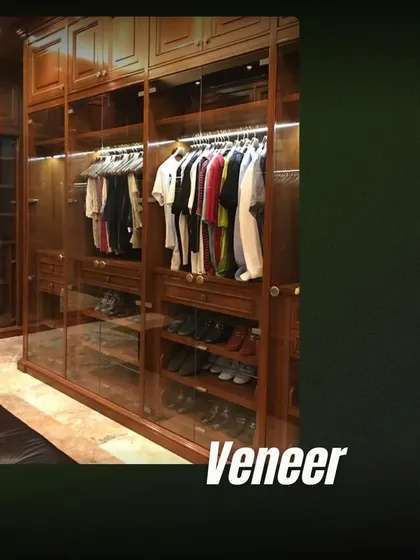 The timeless beauty of a wood veneer finish brings warmth and richness to this walk-in closet. It’s a classic choice that speaks of quality and craftsmanship.