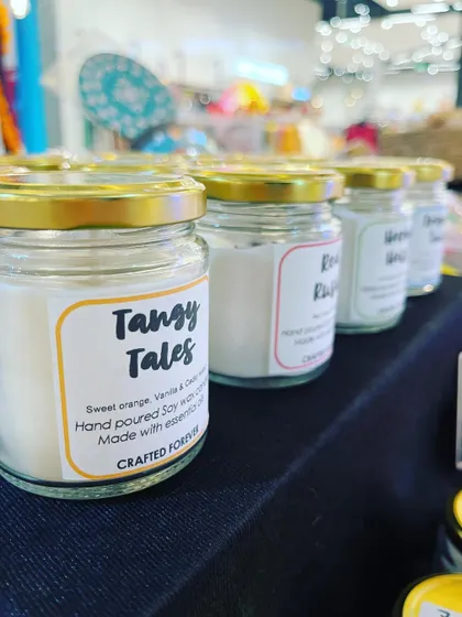 Introducing my first range of 100% soy wax candles! This one, "Tangy Tales," is a blend of sweet orange, vanilla, and cedarwood essential oils.