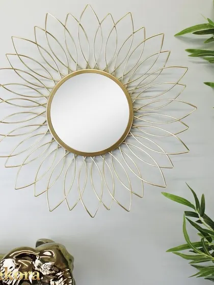 This elegant wall decor mirror has a delicate, flower-like frame that adds a touch of sophistication.