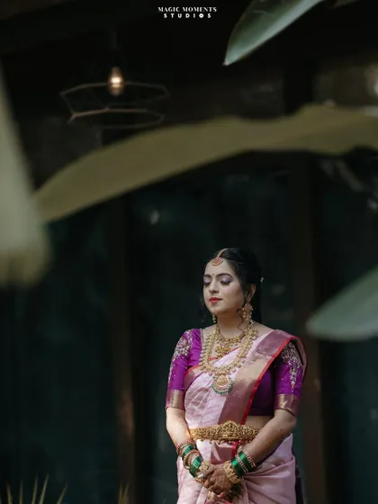 A serene and elegant bridal portrait. The soft lighting and natural background highlight the bride's graceful presence.