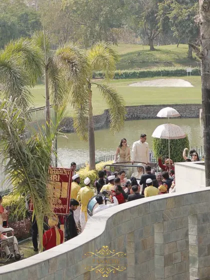 The baraat makes its way along the scenic path of the Jaypee Greens Golf and Spa Resort.