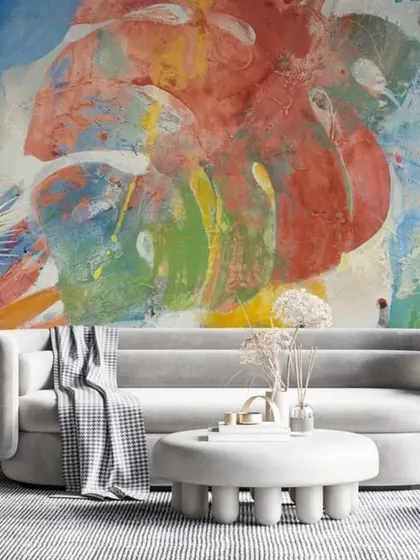 This vibrant, abstract wallpaper uses bold splashes of color to create a dynamic and energetic feel. It's like having a modern painting on your wall, perfect for a creative and contemporary interior.