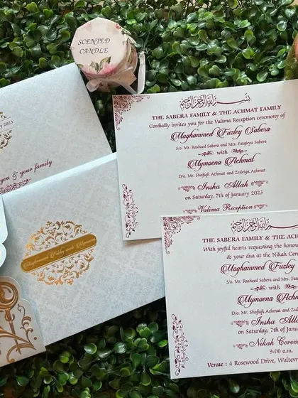 A beautiful gate-fold invitation for a Nikah ceremony. The intricate laser-cut design and foil stamping give it a luxurious feel.