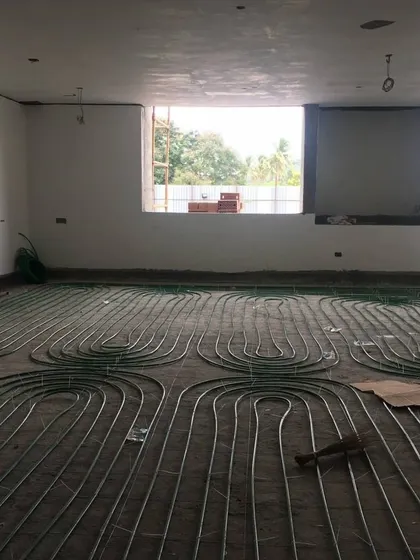 A duplicate image showing the radiant cooling pipe layout. This technology is a key part of our climate-responsive design approach for buildings in hot climates.