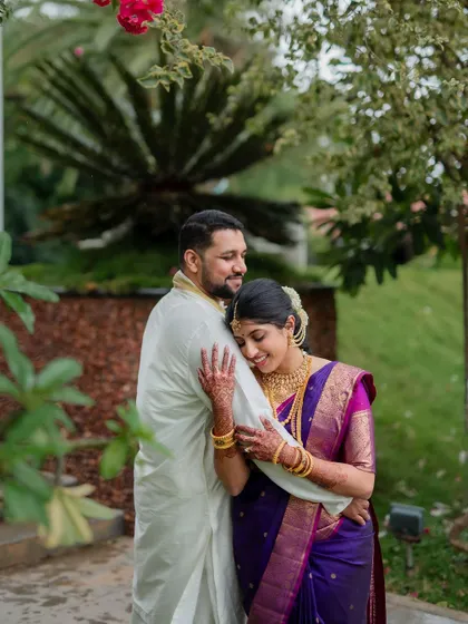 A romantic stroll in the rain. We embrace every element of the wedding day, even a little monsoon magic, to create unique and memorable couple portraits.