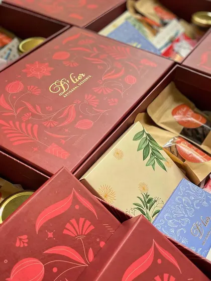 A stunning display of our premium Rakhi hampers, celebrating the special bond between siblings with an abundance of sweet treats.